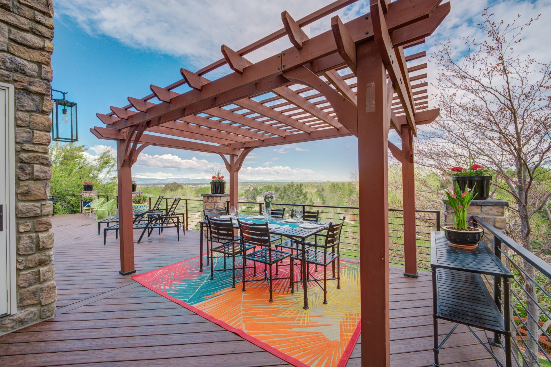 Composite deck with a freestanding pergola